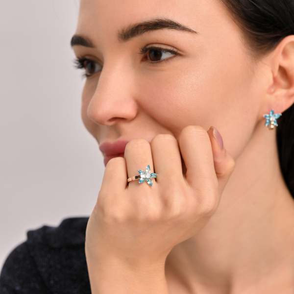 Серебряное кольцо с золотыми вставками (034к)