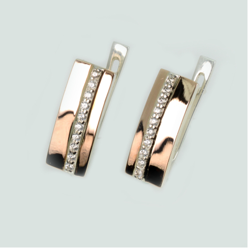 С пластинами из золота серебряные серьги