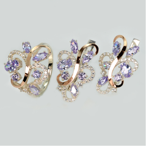 Срібний набір з золотими пластинами