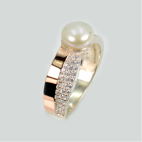 Срібна каблучка з золотими вставками