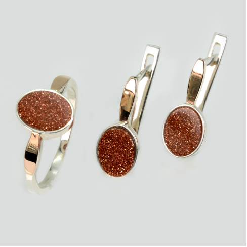 Срібний набір з золотими пластинами