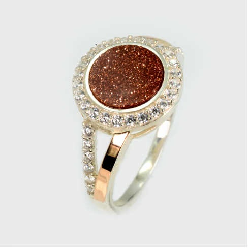 Срібна каблучка з золотими вставками