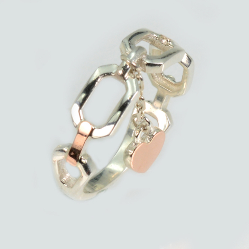 Срібна каблучка з золотими вставками