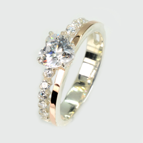 Серебряное кольцо с золотыми вставками