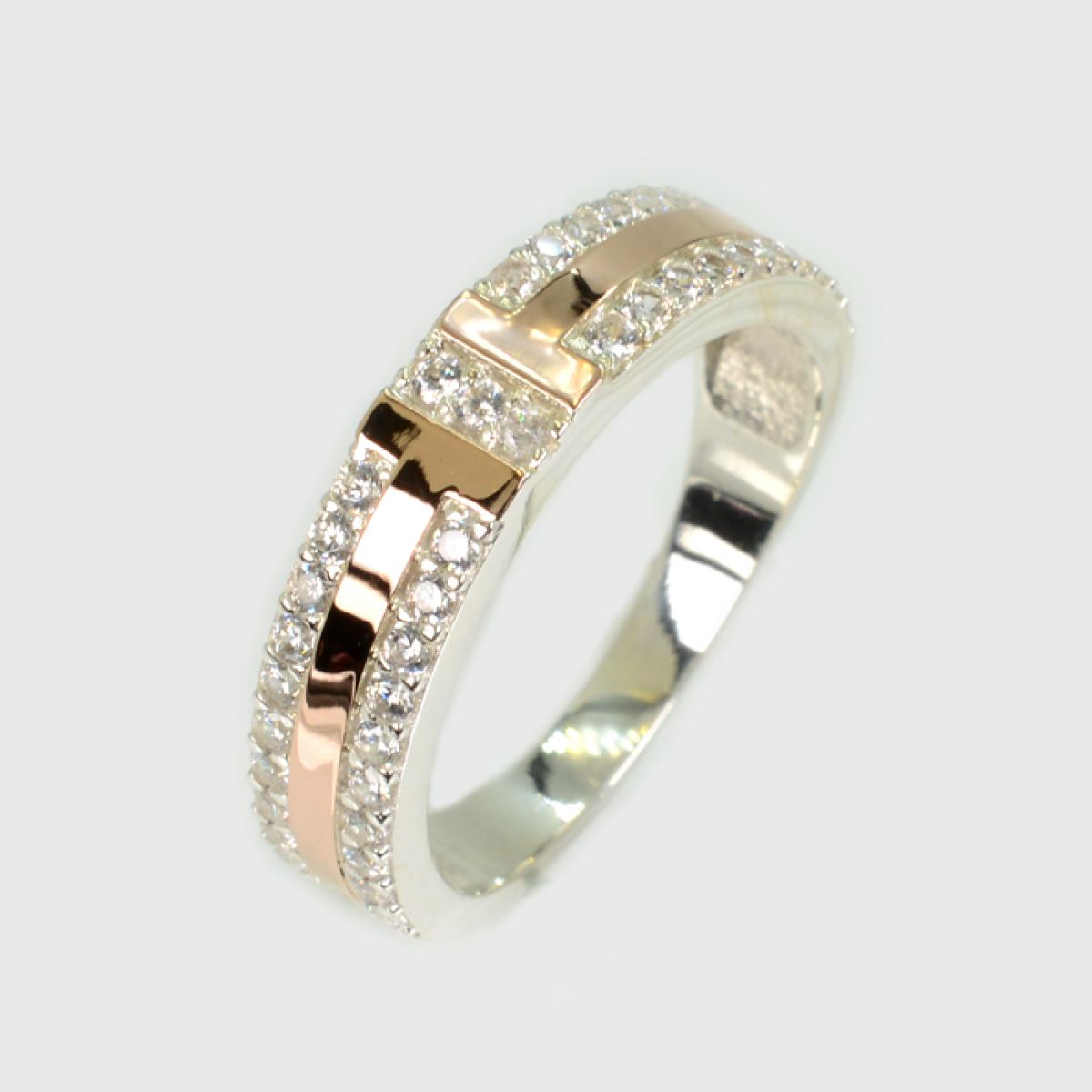 Серебряное кольцо с золотыми вставками (338к)