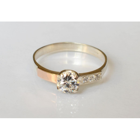 Серебряное кольцо с золотыми вставками