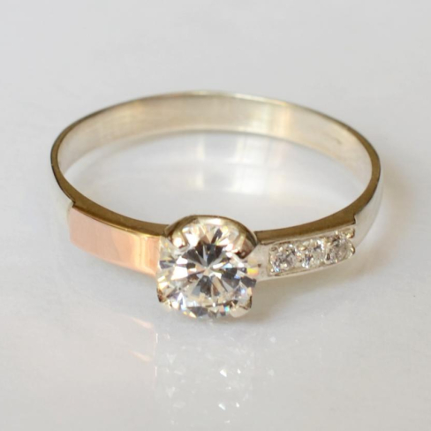 Серебряное кольцо с золотыми вставками