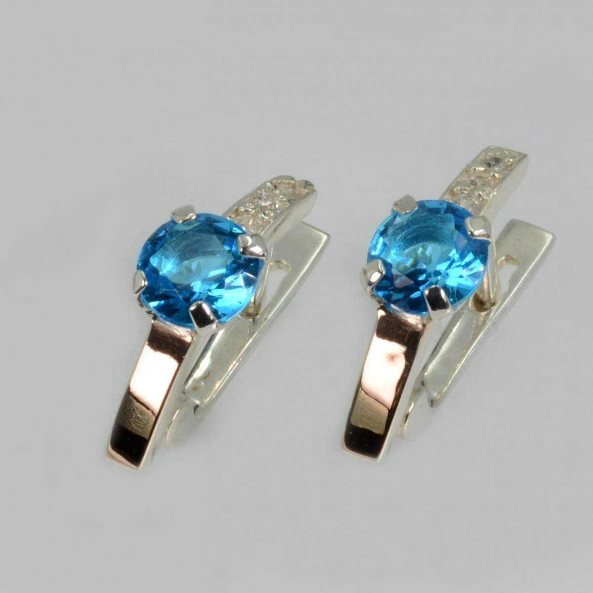 Серебряные серьги со вставками из золота (018с)