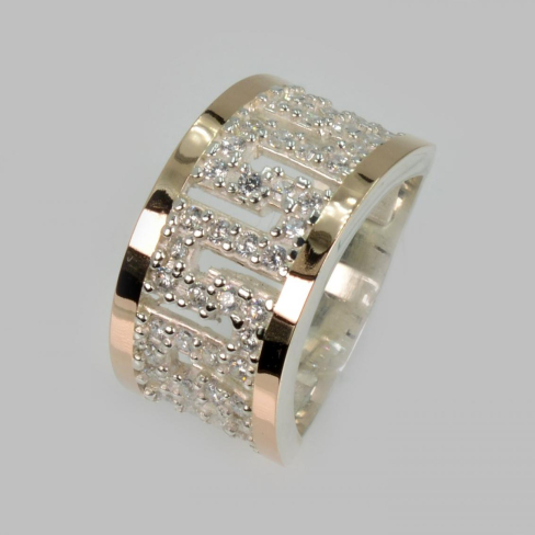 Серебряное кольцо с золотыми вставками.