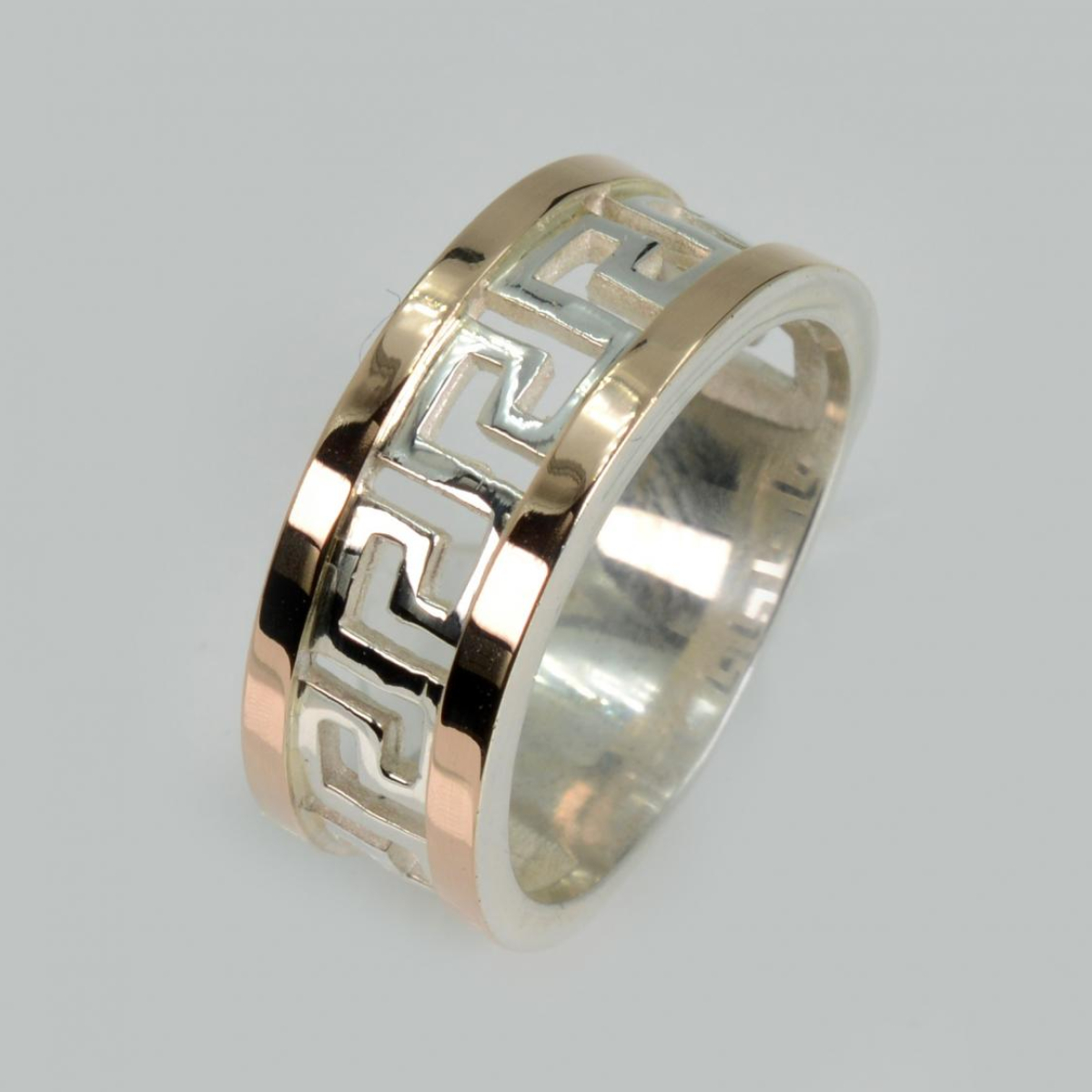 Серебряное кольцо с напайками из золота (022к)