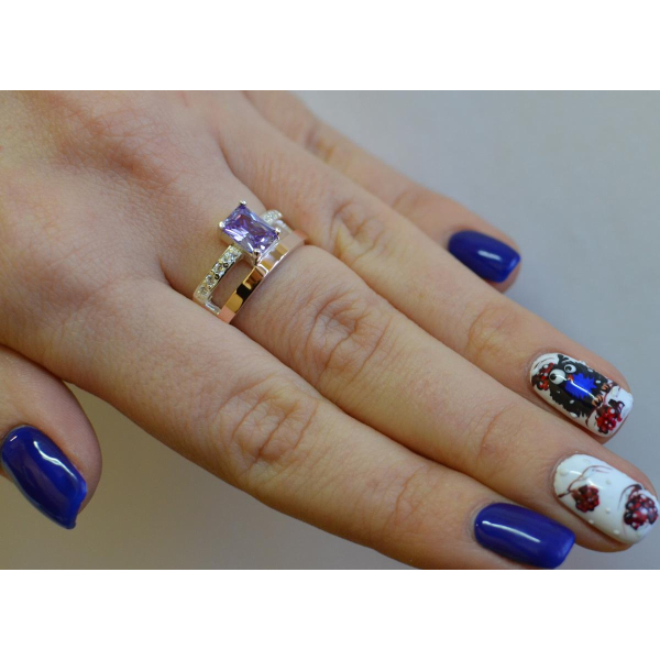 Серебряное кольцо с  накладками из золота (028к)