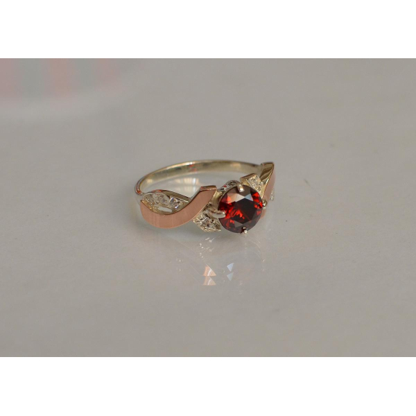 Кольцо серебряное с золотыми вставками (033к)