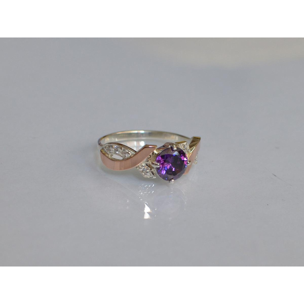 Кольцо серебряное с золотыми вставками (033к)