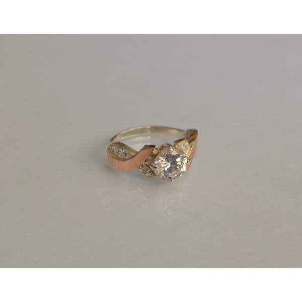 Кольцо серебряное с золотыми вставками (033к)