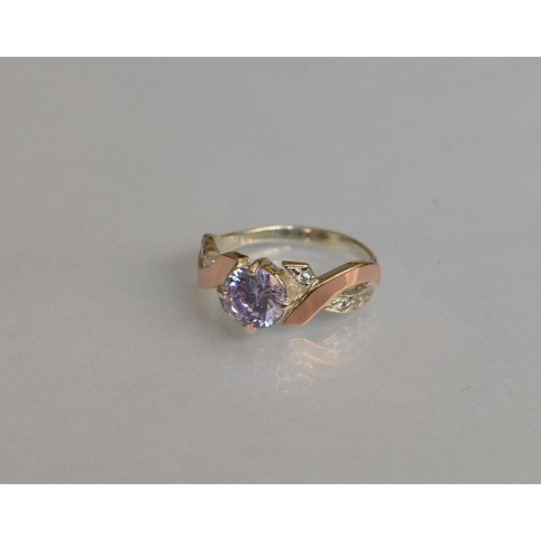 Кольцо серебряное с золотыми вставками (033к)