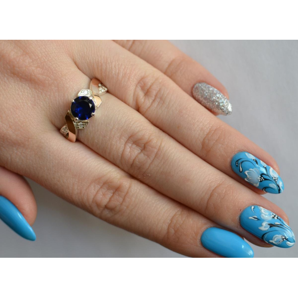 Кольцо серебряное с золотыми вставками (033к)