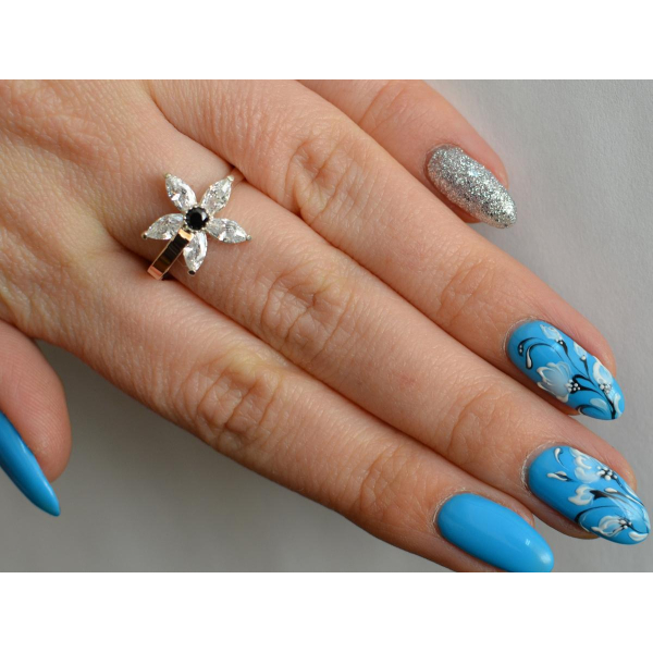 Серебряное кольцо с золотыми вставками (034к)