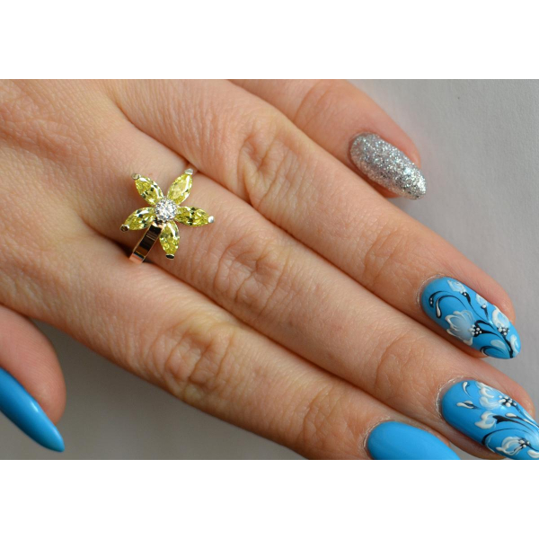 Серебряное кольцо с золотыми вставками (034к)