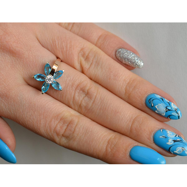 Серебряное кольцо с золотыми вставками (034к)