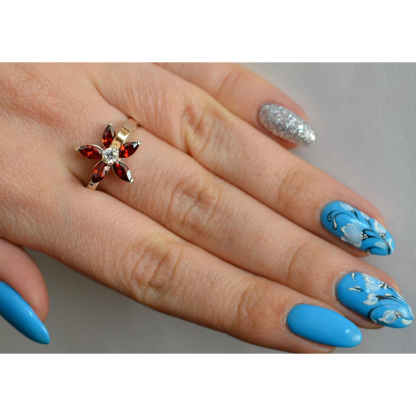 Серебряное кольцо с золотыми вставками (034к)