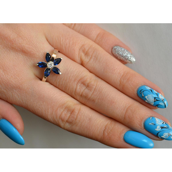 Серебряное кольцо с золотыми вставками (034к)