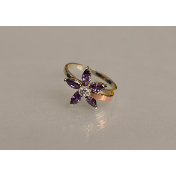 Серебряное кольцо с золотыми вставками (034к)