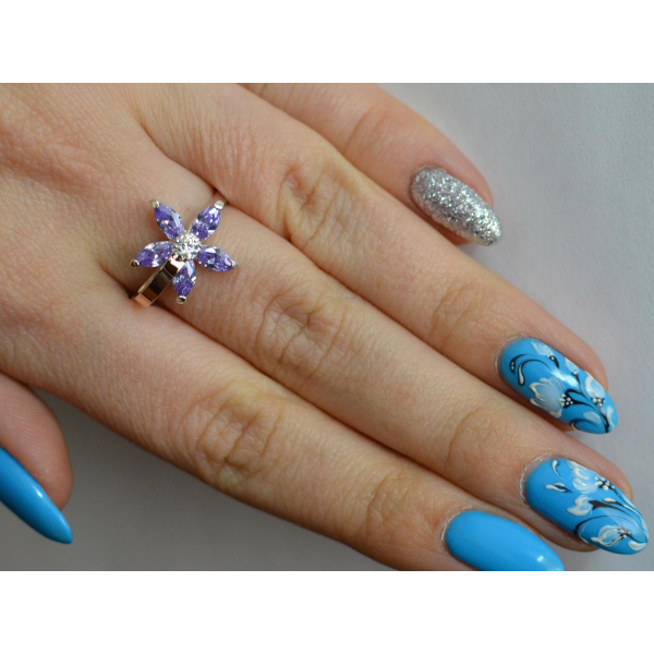 Серебряное кольцо с золотыми вставками (034к)