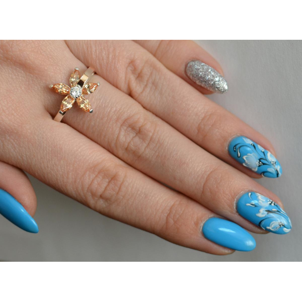 Серебряное кольцо с золотыми вставками (034к)