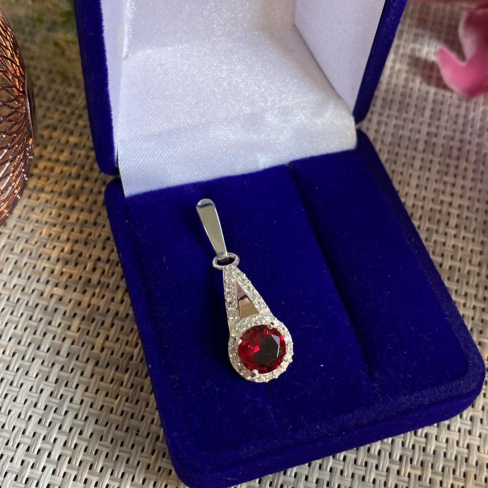 Серебряная подвеска с золотими вставками