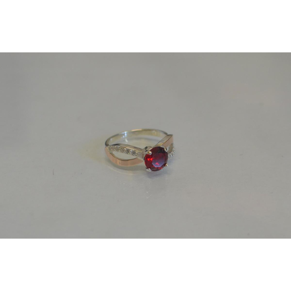 Серебряное кольцо с золотыми вставками (062к)