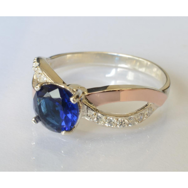 Серебряное кольцо с золотыми вставками (062к)