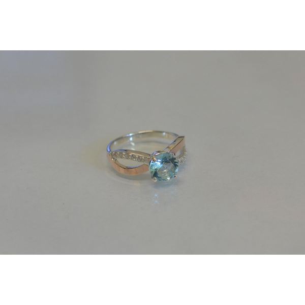 Серебряное кольцо с золотыми вставками (062к)