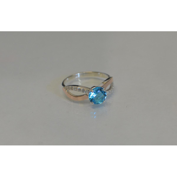 Серебряное кольцо с золотыми вставками (062к)