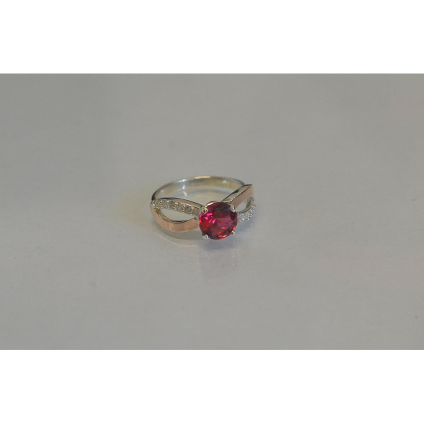 Серебряное кольцо с золотыми вставками (062к)