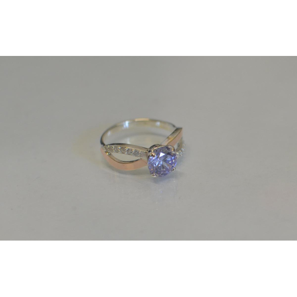 Серебряное кольцо с золотыми вставками (062к)