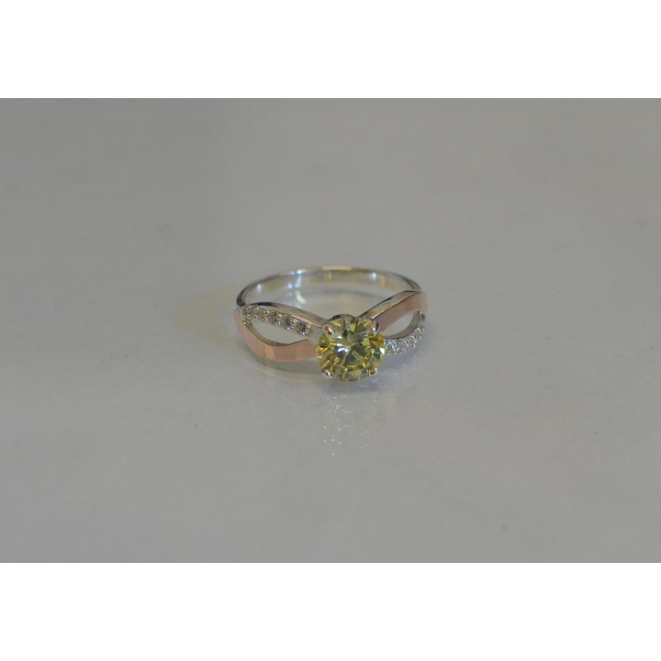 Серебряное кольцо с золотыми вставками (062к)