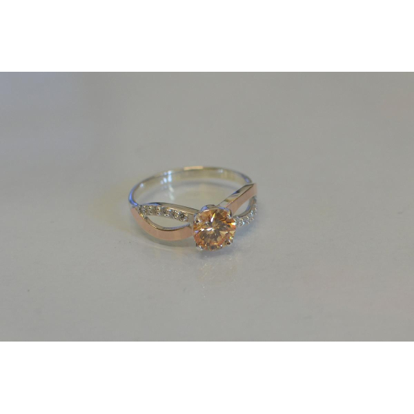 Серебряное кольцо с золотыми вставками (062к)