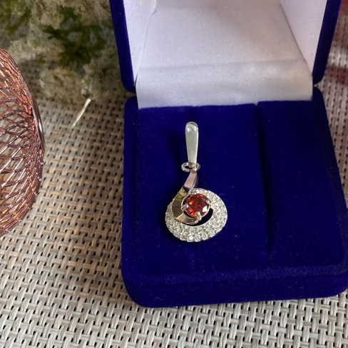 Серебряная подвеска с золотими вставками