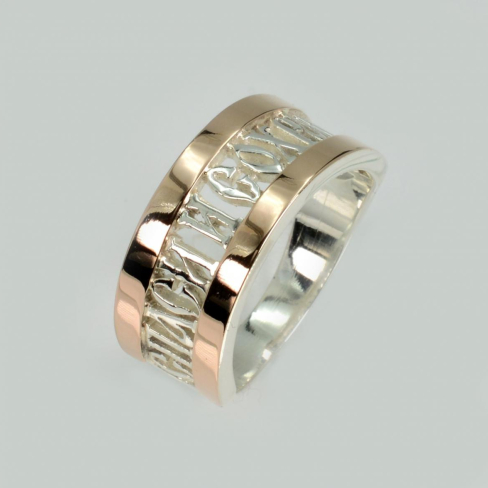 Серебряное кольцо  с пластинами из золота