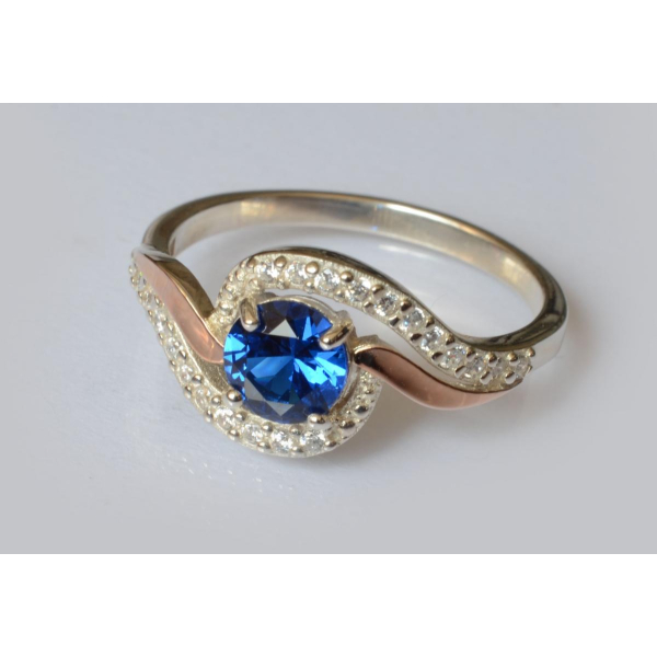 Серебряное кольцо с золотыми пластинами (072к)