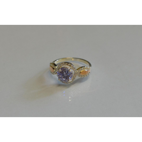 Серебряное кольцо с золотыми пластинками (089к)