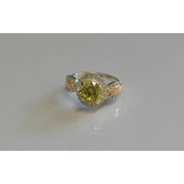 Серебряное кольцо с золотыми пластинками (089к)