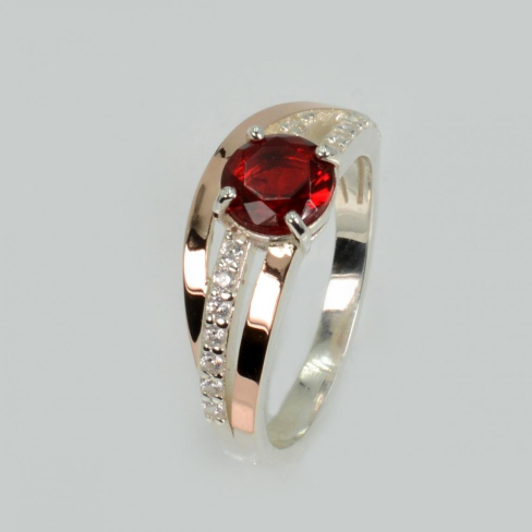 Срібне кільце з золотими вставками