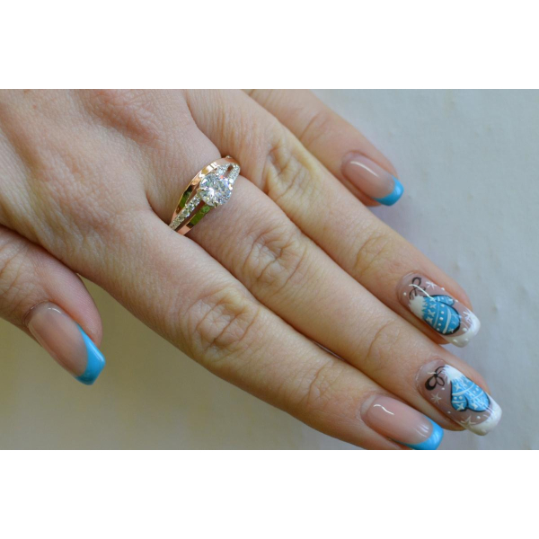 Срібне кільце з золотими вставками (108к)