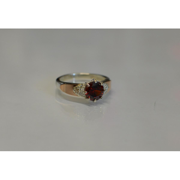 Серебряное кольцо с золотыми вставками (124к)