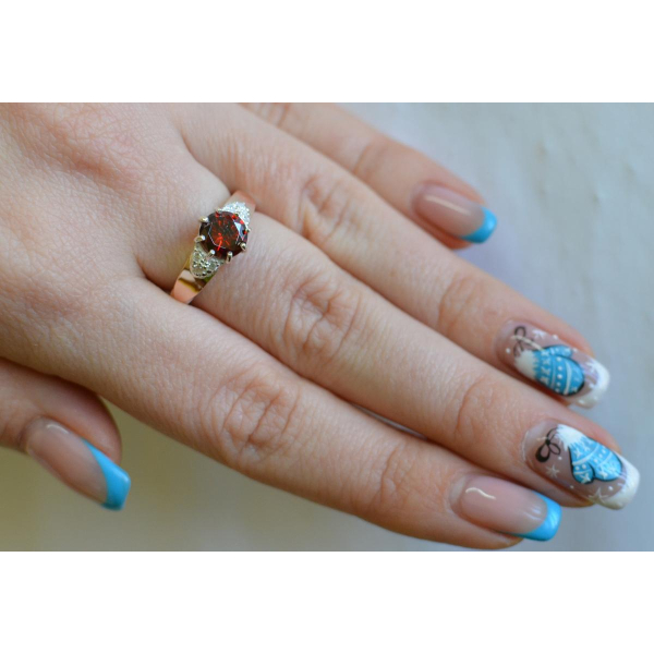 Серебряное кольцо с золотыми вставками (124к)