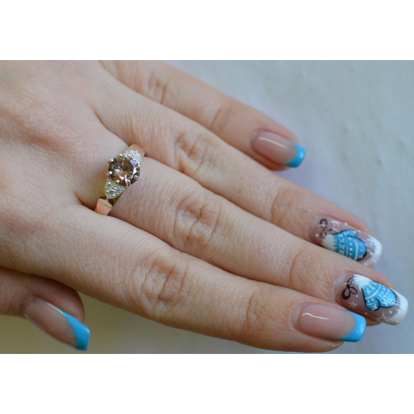 Серебряное кольцо с золотыми вставками (124к)