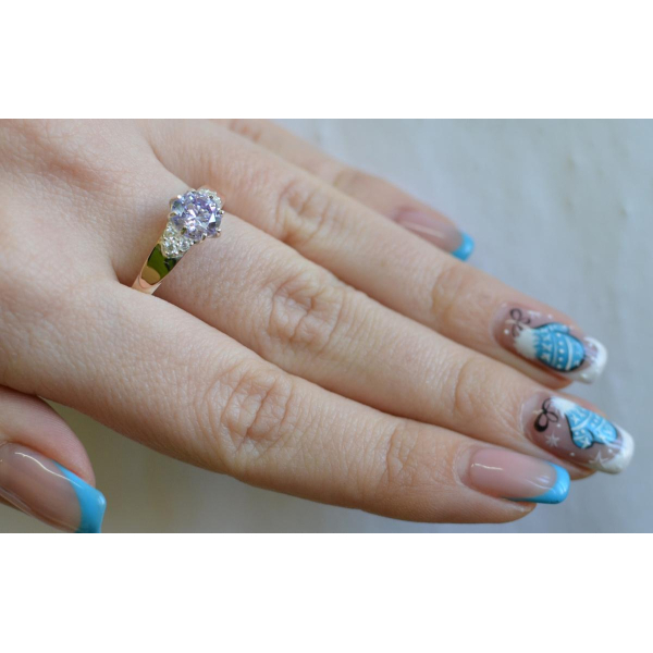 Серебряное кольцо с золотыми вставками (124к)