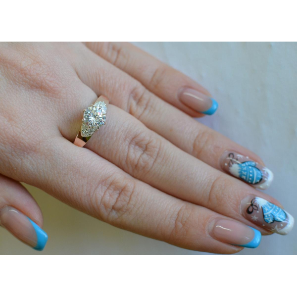 Серебряное кольцо с золотыми вставками (124к)