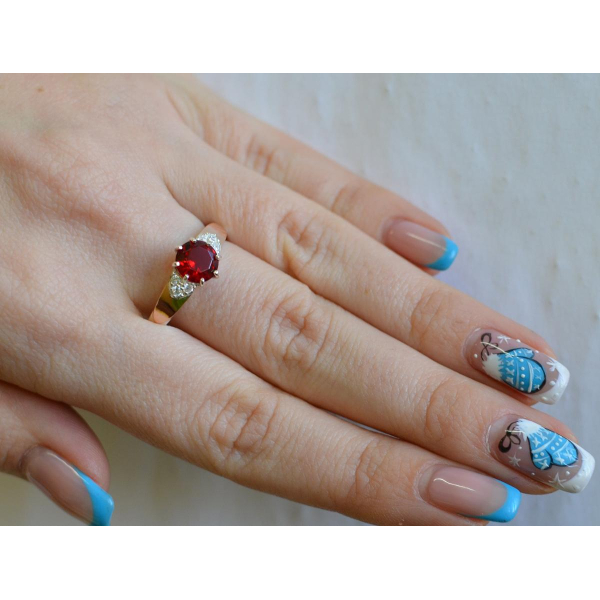 Серебряное кольцо с золотыми вставками (124к)